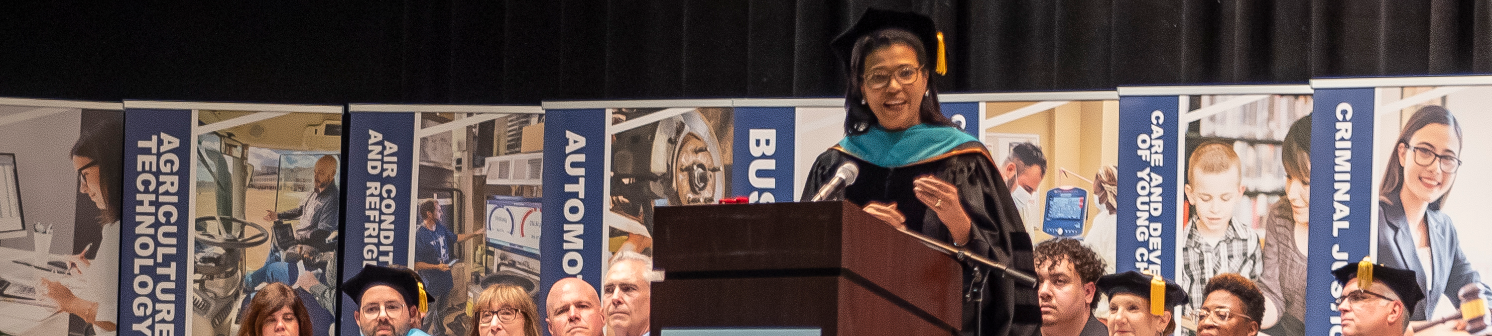 commissioner at podium