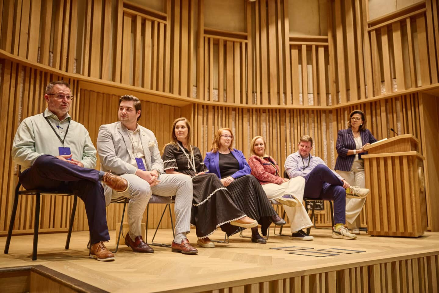 Commissioner Kim Hunter Reed moderates a work-based learning panel at Oxford University.