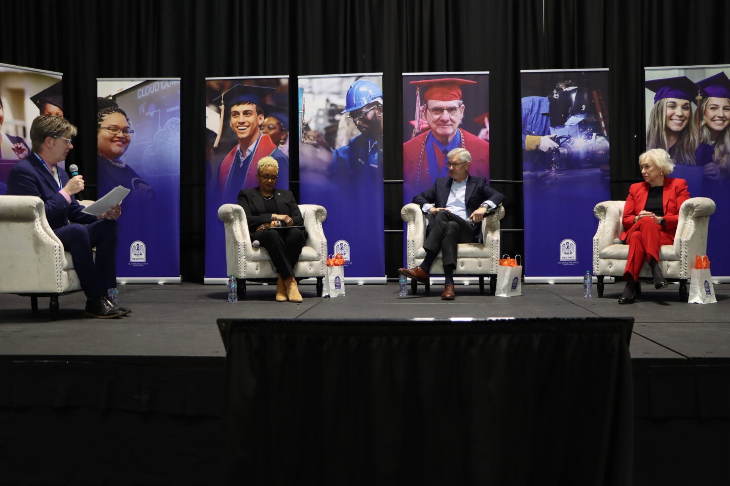 Dr. Samuel Gladden moderates the Higher Education Today panel at Meauxmentum Summit.